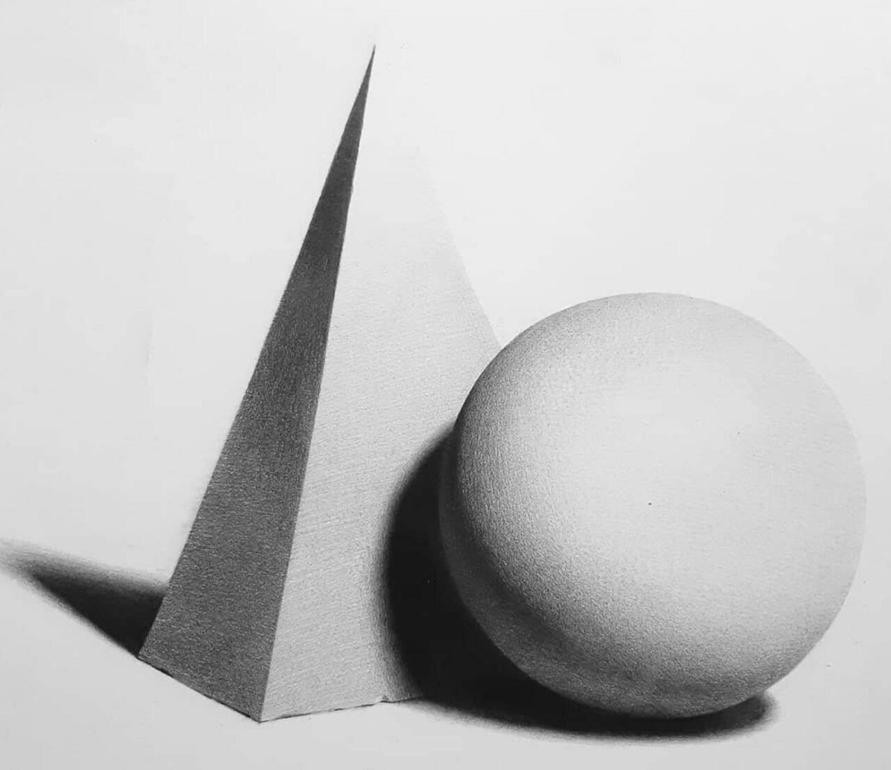 Pencil study of a cone and sphere with directional light and cast shadows
